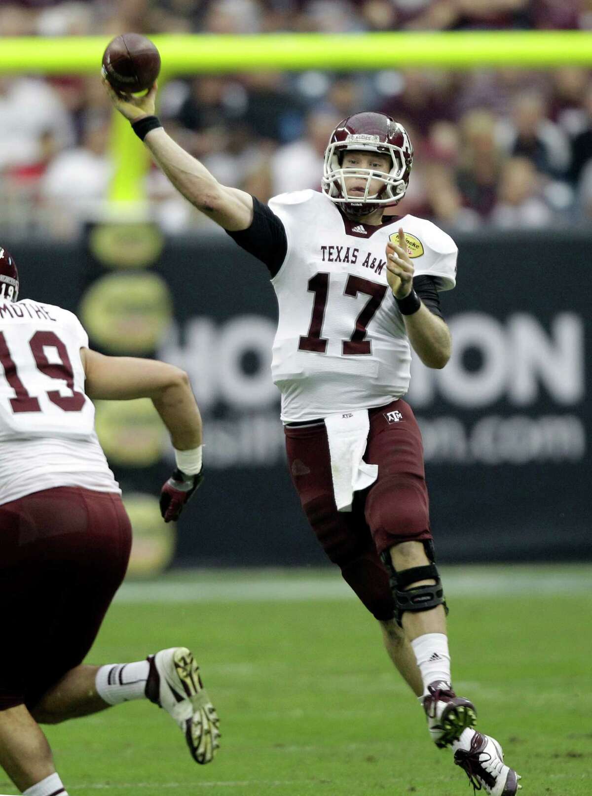 FOR USE AS DESIRED WITH NFL DRAFT STORIES - FILE - In this Dec. 31, 2011, file photo, Texas A&M quarterback Ryan Tannehill (17) throws a pass against Northwestern during the first quarter of the Car Care Bowl NCAA college football game in Houston. Tennehill is a top prospect in the upcoming NFL football draft.
