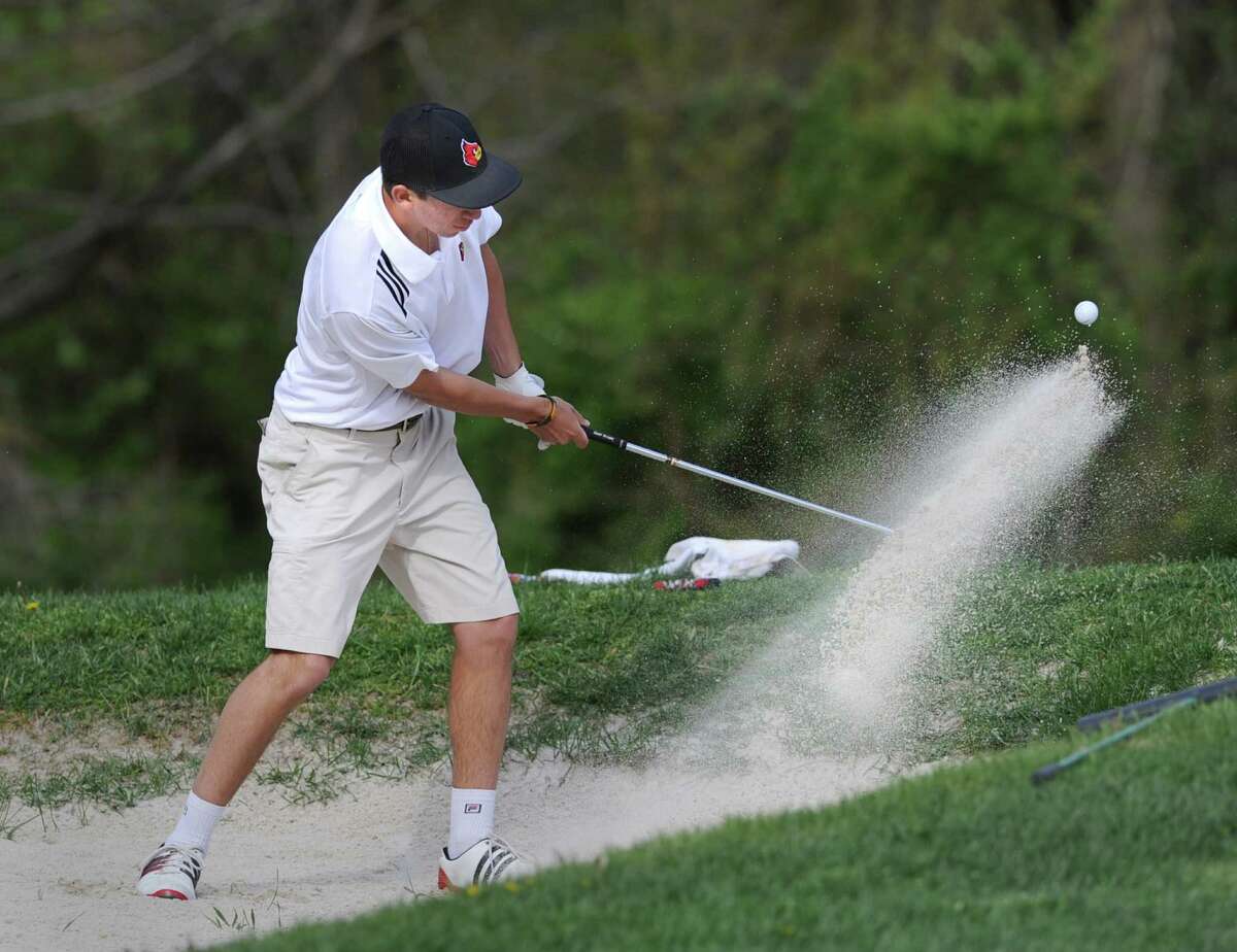 Stephen Pastore of Greenwich shoots out of a bunker onto the second green durng the boys high school golf match between Greenwich High School and St. Joseph of Trumbull at Griffith E. Harris Golf Course in Greenwich, Tuesday, April 24, 2012.