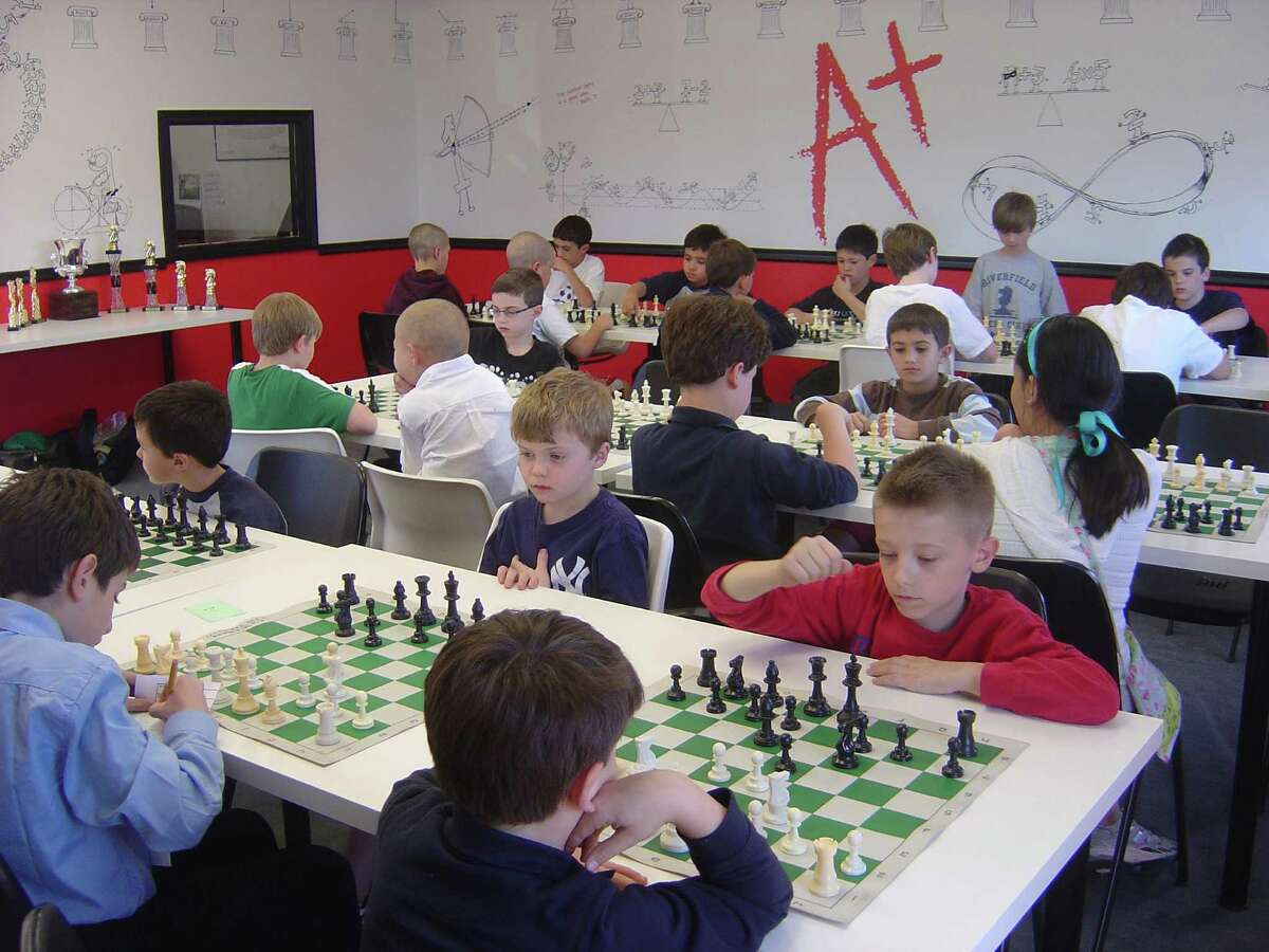Members of the chess teams competing in the recent Town of Fairfield Scholastic Chess Championships show keen concentration as they vie for first place in the individual and team categories.