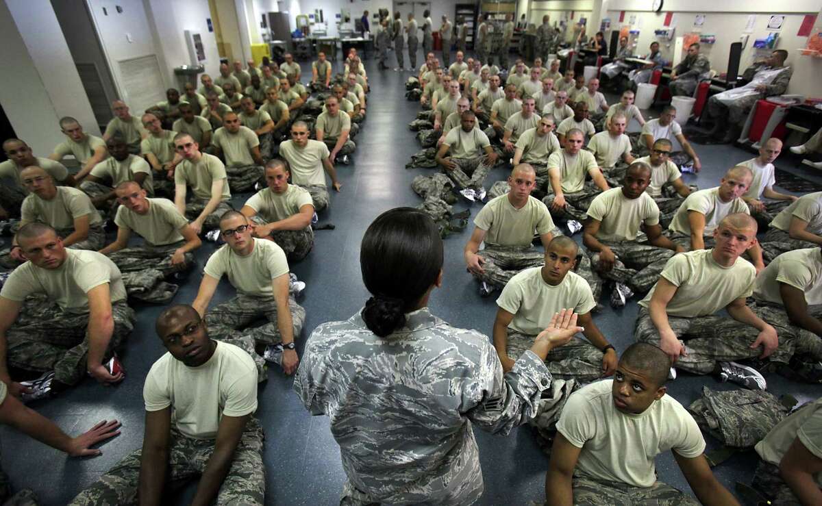 New trainees listen to instructions at Joint Base San Antonio-Lackland. Men who are victims of unwanted sexual contact are less likely to report it than women.