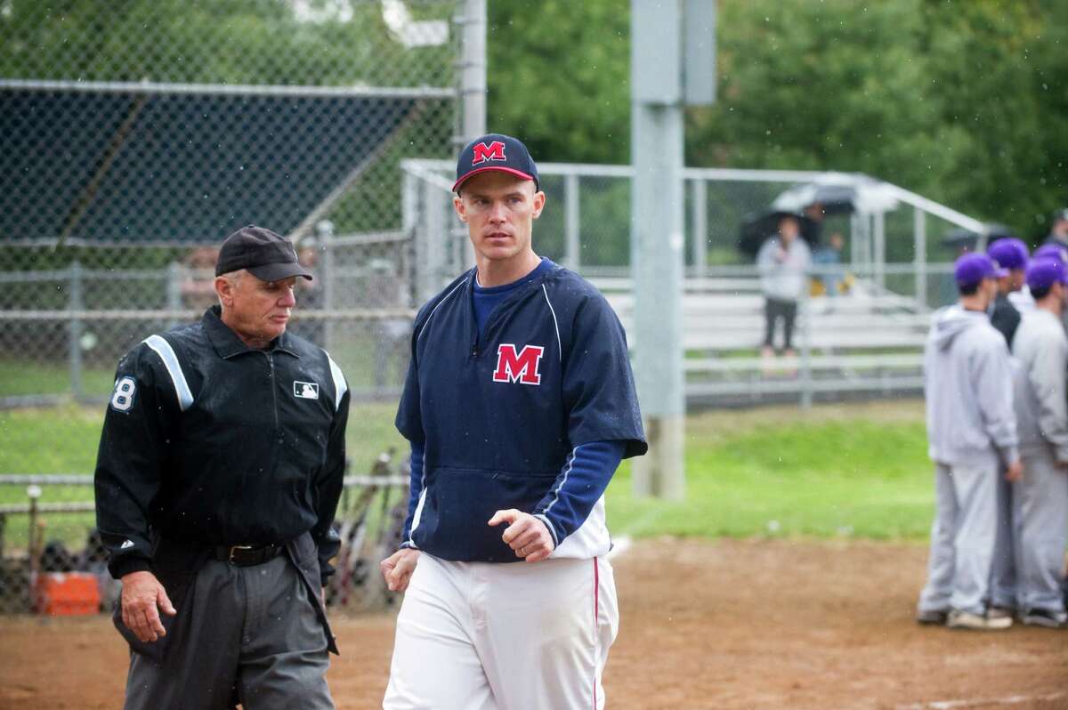 McMahon Coach John Cross on hand as Brien McMahon hosts Westhill High School in a baseball game in Norwalk, Conn., April 25, 2012.