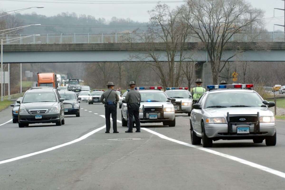 Connecticut State Troopers block the new Rt 7 bypass prior to the ribbon cutting ceremony Thursday, Nov. 19, 2009.