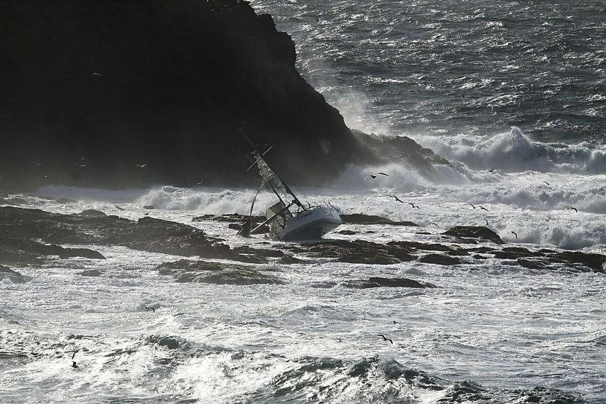 This photo shows The Low Speed Chase, a 38-foot sailboat from the San Francisco Yacht Club in Belvedere, on Saturday, April 14, after it was slammed broadside by a 12-foot wave as it rounded the Farallones during the Full Crew Farallones Race. Five of eight crew members washed overboard, and the boat crashed into the rocks.