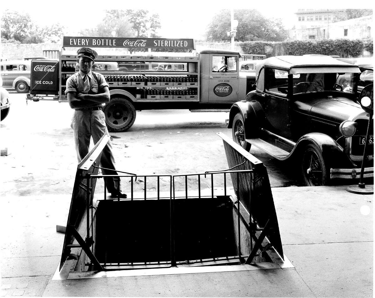 A Coca-Cola delivery at the F.W. Woolworth Co.store on Houston Street and Alamo Plaze in the 1930s.