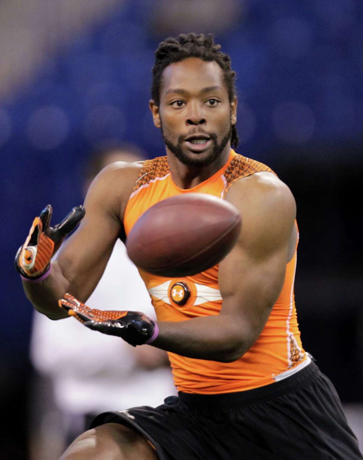 Michigan State receiver Keshawn Martin makes a catch as he runs a drill at the NFL football scouting combine in Indianapolis, Sunday, Feb. 26, 2012. (AP Photo/Michael Conroy)
