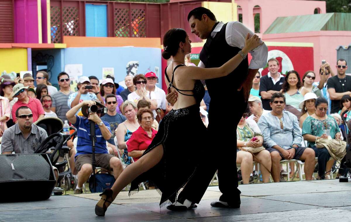 Mauro Marcone and Elizabeth Wingfield, with the Argentine Tango Club, perform on the HEB Cultural Stage during the Houston International Festival Sunday, April 29, 2012, in Houston.