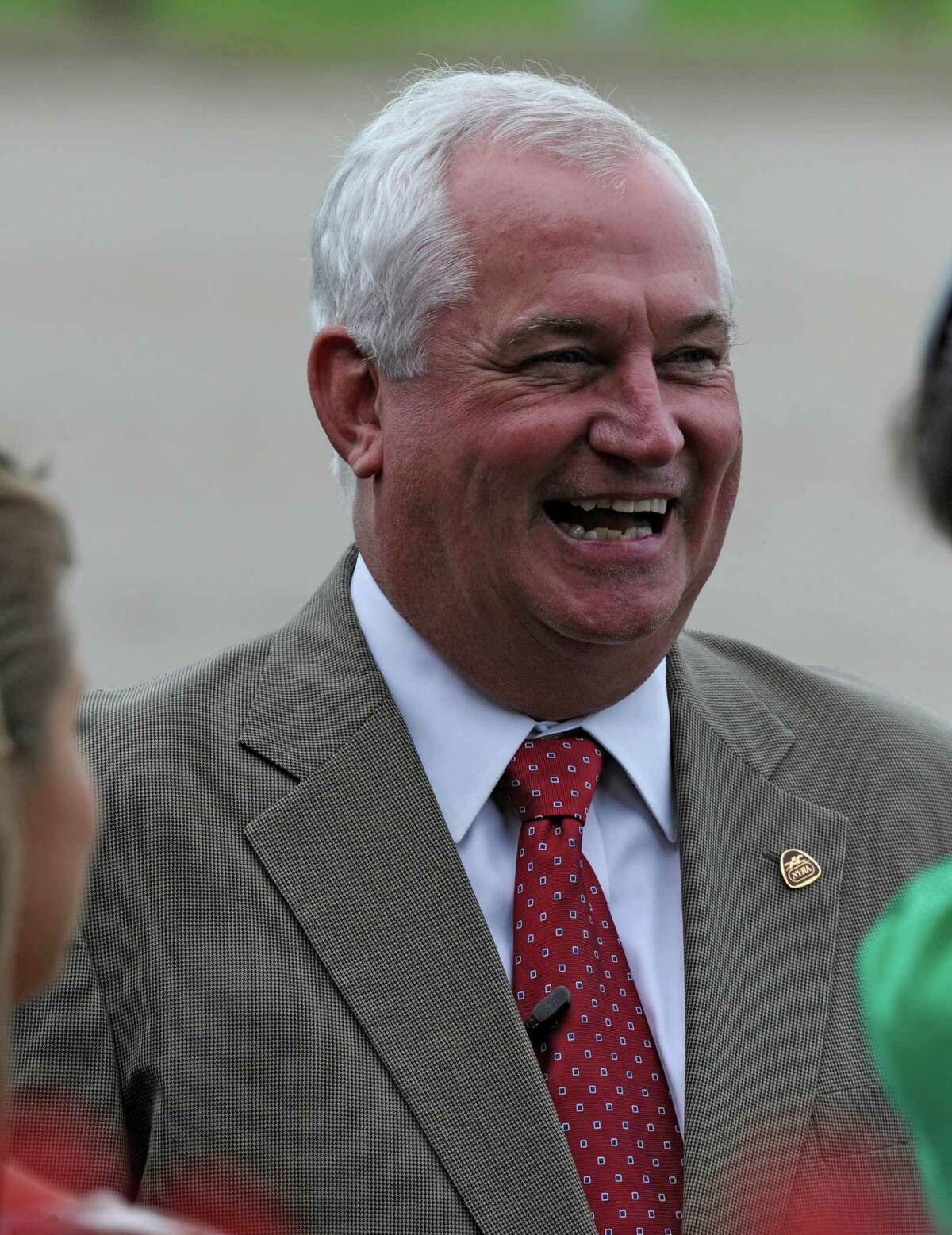 CEO of NYRA Charles E. Hayward is all smiles during an interview at the Saratoga Race Course in Saratoga Springs, N.Y., Aug. 25, 2011. (Skip Dickstein / Times Union)