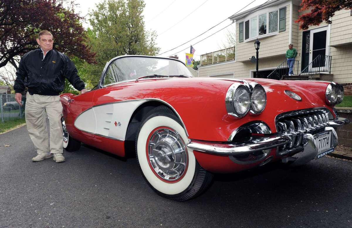 Sam Romeo with his 1959 Chevrolet Corvette near his home on Neighborly Way in Riverside, Wednesday, April 18, 2012. Under a controversial bill that is making the rounds in the General Assembly, automobiles with Early American license plates, such as Romeo's, would be taxed at a higher rate.