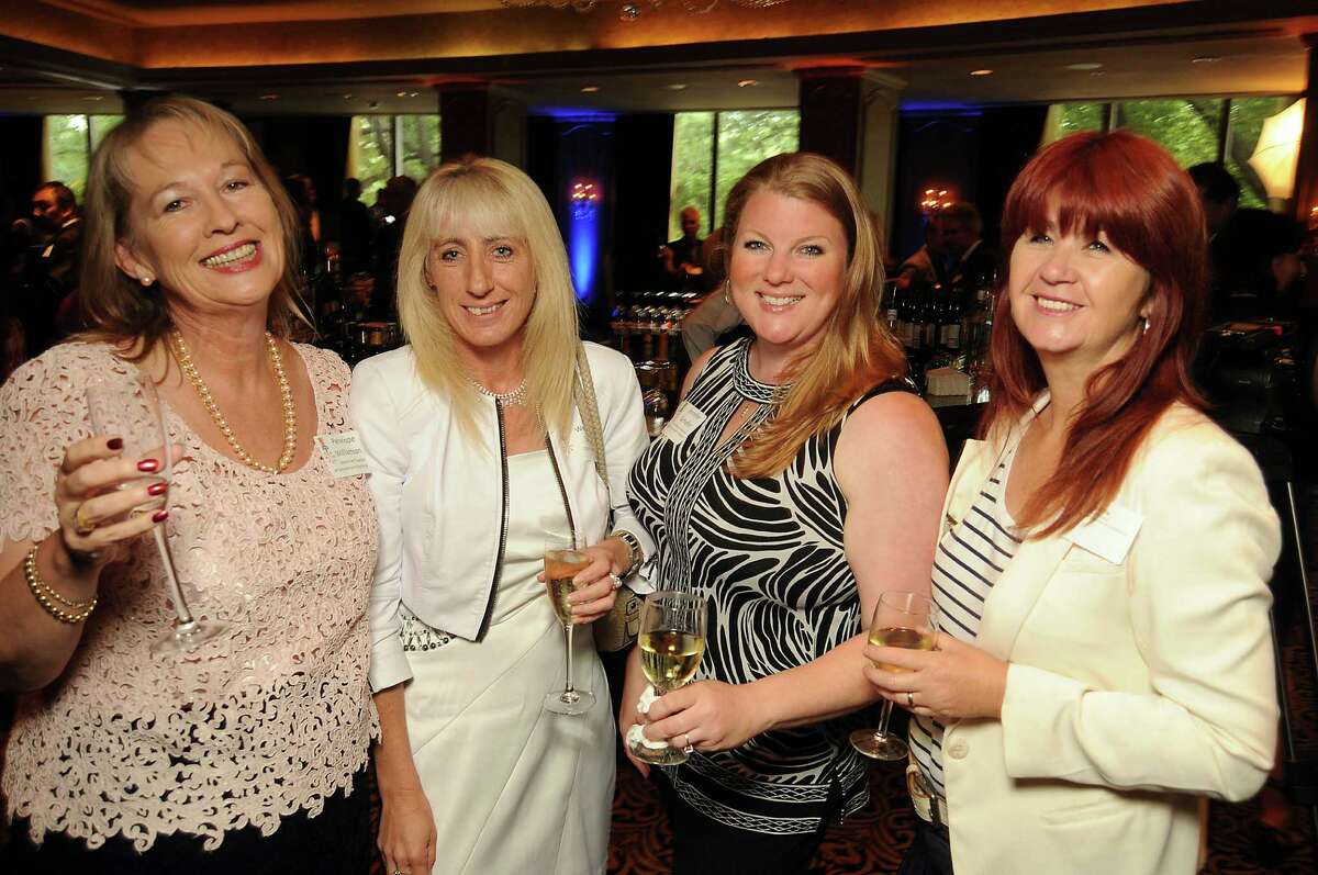 From left: Penelope Williamson, Wendy Earle, Jennifer Schafer and Lynn Ellis at the World Energy Cities Partnership reception at the Hotel ZaZa Tuesday May 1,2012. (Dave Rossman Photo)