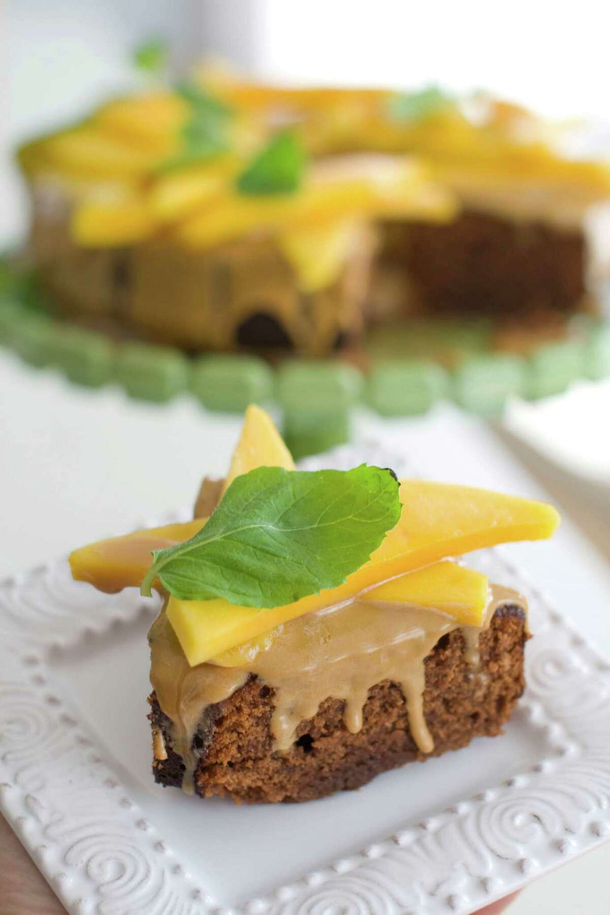 In this image taken on March 26, 2012 a mango-topped chocolate honey cake is seen in Concord, N.H. (AP Photo/Matthew Mead)