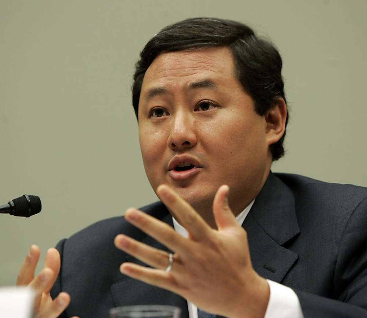 In this June 26, 2008 file photo John Yoo, a law professor at the University of California at Berkeley, testifies on Capitol Hill in Washington. Justice Department officials have stopped short of recommending criminal charges against Bush administration lawyers who wrote secret memos approving harsh interrogation techniques of terror suspects. (AP Photo/Susan Walsh, File)