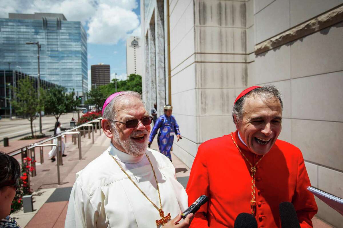 Houston native George Arthur Sheltz, left, and Cardinal Daniel DiNardo laugh before Sheltz was ordained a Catholic bishop at the Co-Cathedral of the Sacred Heart, Wednesday, May 2, 2012, in Houston. 