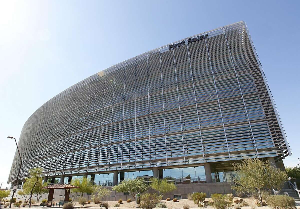 This Wednesday, April 18, 2012 photo shows First Solar Inc's corporate headquarters in Tempe, Ariz. First Solar Inc will lay off 2,000 workers and close it's factory in Germany following a collapse in solar panel prices. First Solar is America's biggest solar manufacturer and the layoffs amount to 30 percent of its global workforce. (AP Photo/Matt York)