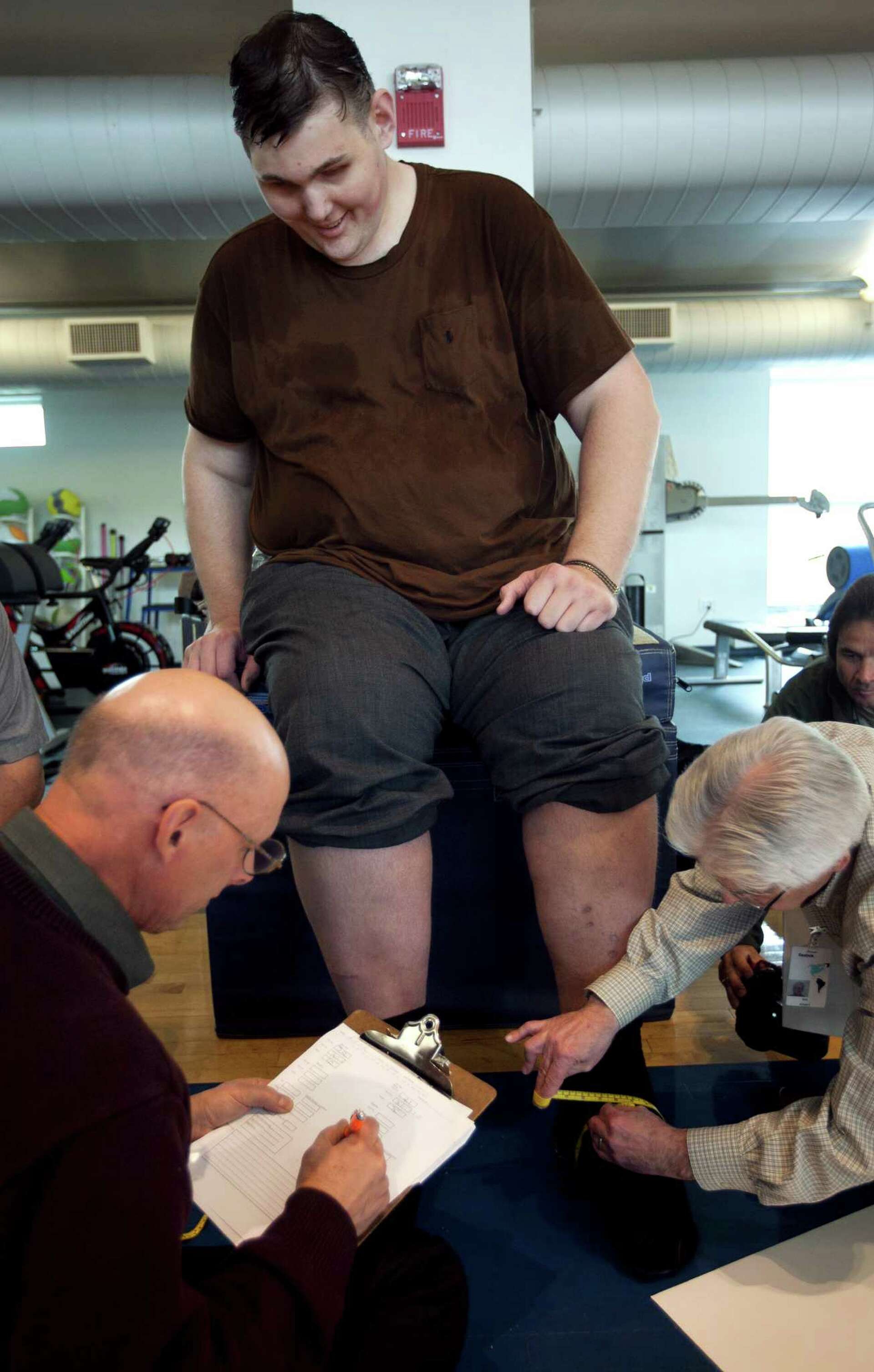 Tallest man in US in Mass. seeking shoes, normalcy