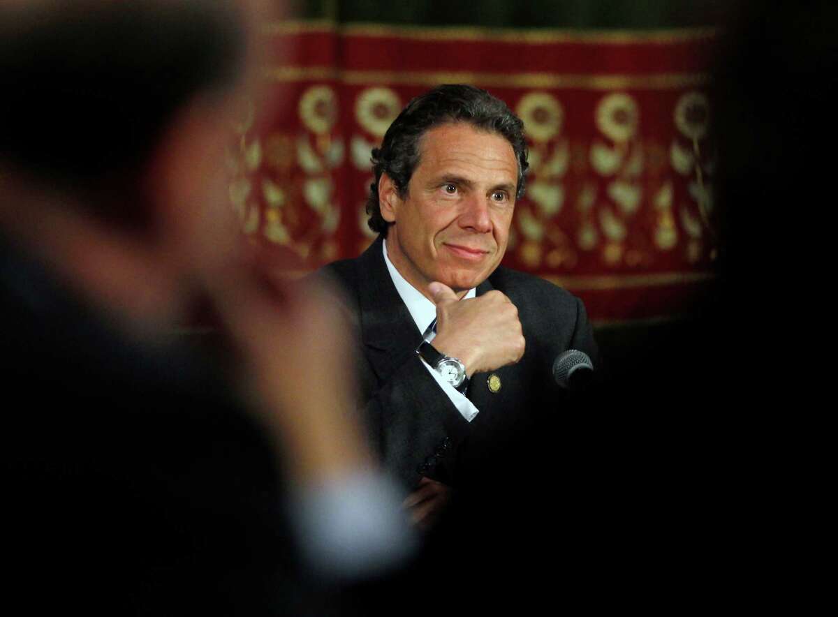 New York Gov. Andrew Cuomo listens to a speaker during a NY Works news conference in the Red Room at the Capitol in Albany, N.Y., on Thursday, May 3, 2012. Cuomo says hes considering new ideas to pay for replacing the Tappan Zee Bridge after the federal government rejected a $2 billion loan application. The proposed $5.2 billion Tappan Zee is a high priority for Cuomo. It would build two spans to replace an aging, overcrowded bridge across the Hudson in New York City's suburbs. (AP Photo/Mike Groll)