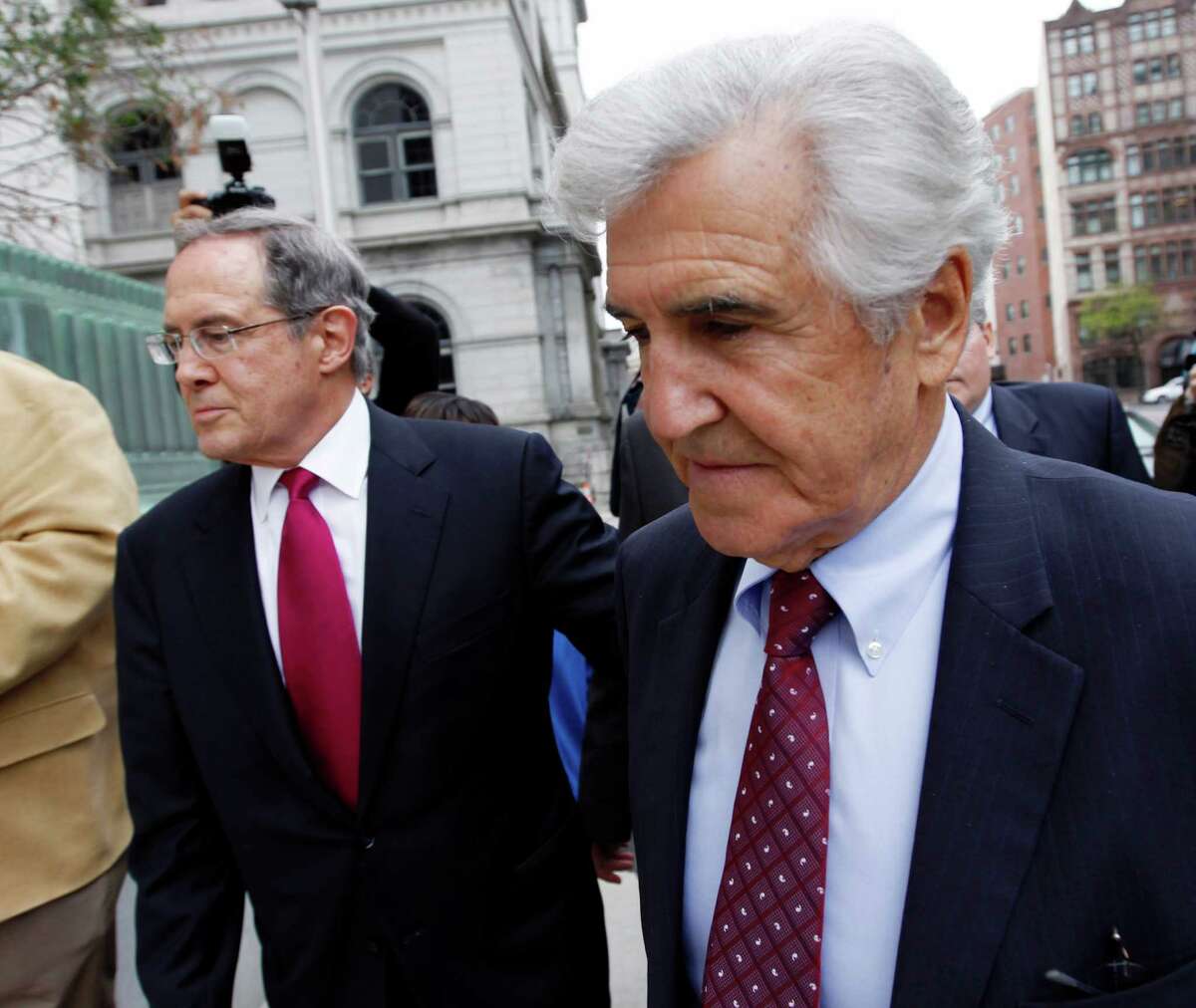 Former state Sen. Joseph Bruno, right, arrives at federal court in Albany, N.Y., with his attorney E. Stewart Jones, on Thursday, May 3, 2012. Defense attorney William Dreyer says he and Bruno have been told be in court Thursday, but haven't been told why. Federal prosecutors have said they'd pursue a new indictment after the appeals court last year rejected convictions of Bruno, now 83, on two counts of honest services fraud. (AP Photo / Mike Groll)