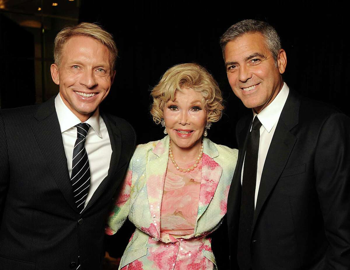 From left: Scott Brogan, Joanne King Herring and George Clooney at the VIP reception before Clooney's appearance at the Brilliant Lecture Series at the Wortham Theater Thursday May 3,2012. (Dave Rossman Photo)