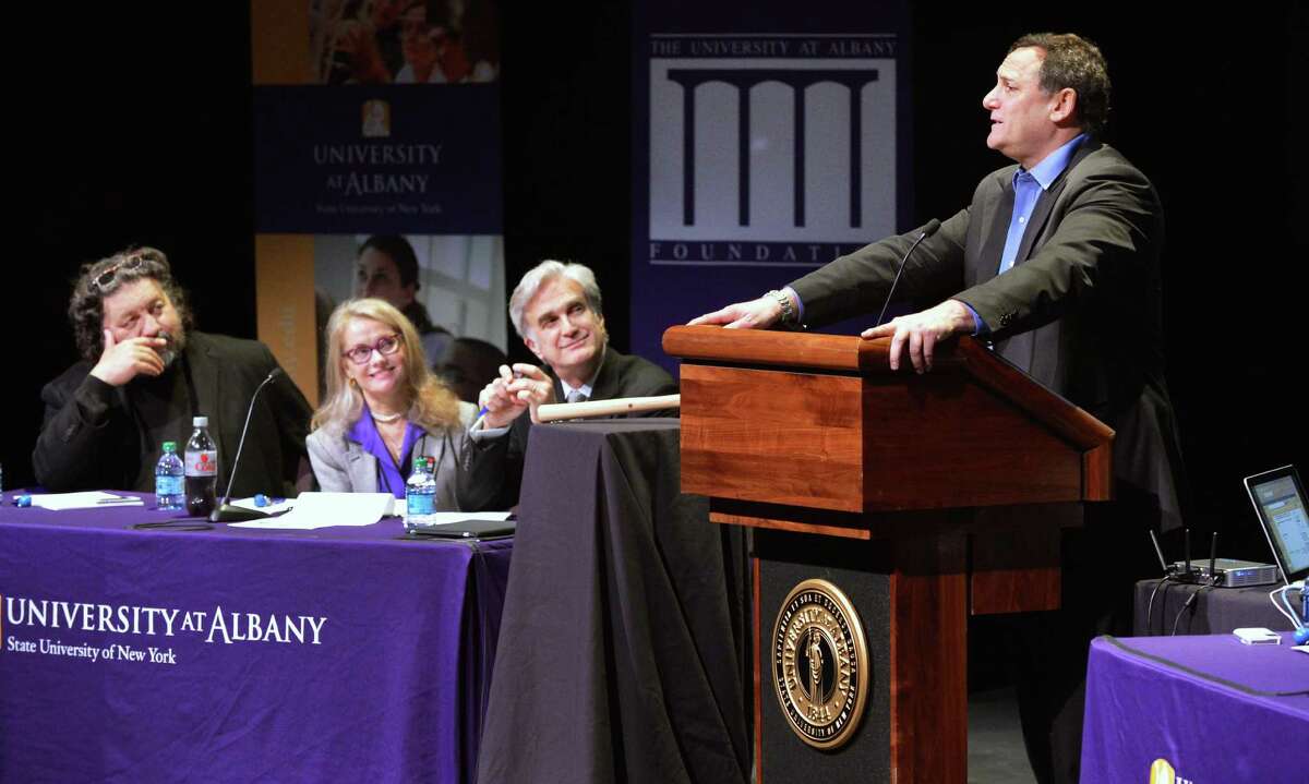 Craig Hatkoff, at right, co-founder of Tribeca Film Festival speaks as part of a panel discussion on local film production at UAlbany Thursday May 3, 2012. From left are Philip Morris, CEO of Proctors, Patricia Swinney Kaufman, executive director of the New York State Governor's Office for Motion Picture and Television Development and Times Union editor Rex Smith. (John Carl D'Annibale / Times Union)