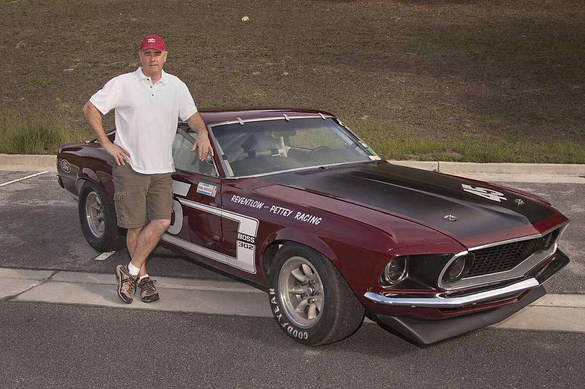 Ken Adams, 52, was born in San Francisco, has lived his whole life in Northern California, currently resides in Gilroy and works in the agri-business industry in Salinas. He has been racing since 1997, and his previous vintage cars include a '66 Mustang, a '66 Shelby and an '87 Thunderbird NASCAR. His favorite track is Mazda Raceway Laguna Seca. Here he stands next to his 1969 Mustang Boss 302 Trans Am race car.