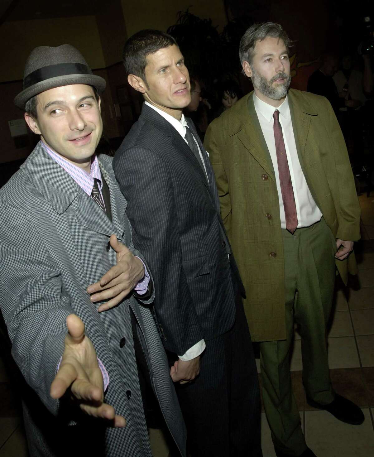 Left to right, Beastie Boys Adrock (Adam Horovitz), Mike D (Michael Diamond), and MCA (Adam Yauch) arrive at the premiere of their new film "Awesome; I ... Shot That!" Tuesday, March 28, 2006 in New York. The film, which documents a 2004 Beastie Boys concert at New York's Madison Square Garden, is comprised of footage shot by 50 fans who were given cameras to record the show. The film will be released in selected cities Friday, March 31, 2006.