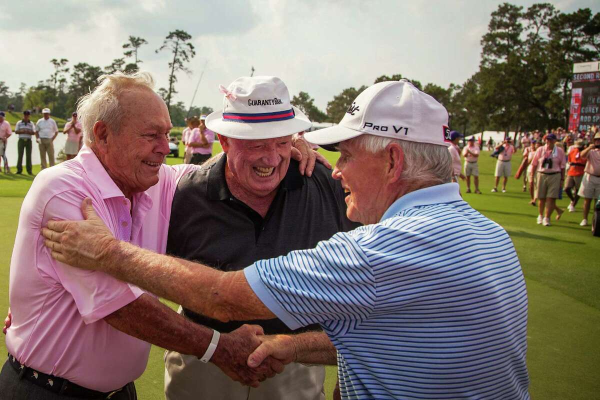 Arnold Palmer, left, celebrates with Don January, center, and Gene Littler after The Insperity Championship Greats of Golf exhibition at The Woodlands Country Club on Saturday, May 5, 2012, in The Woodlands.