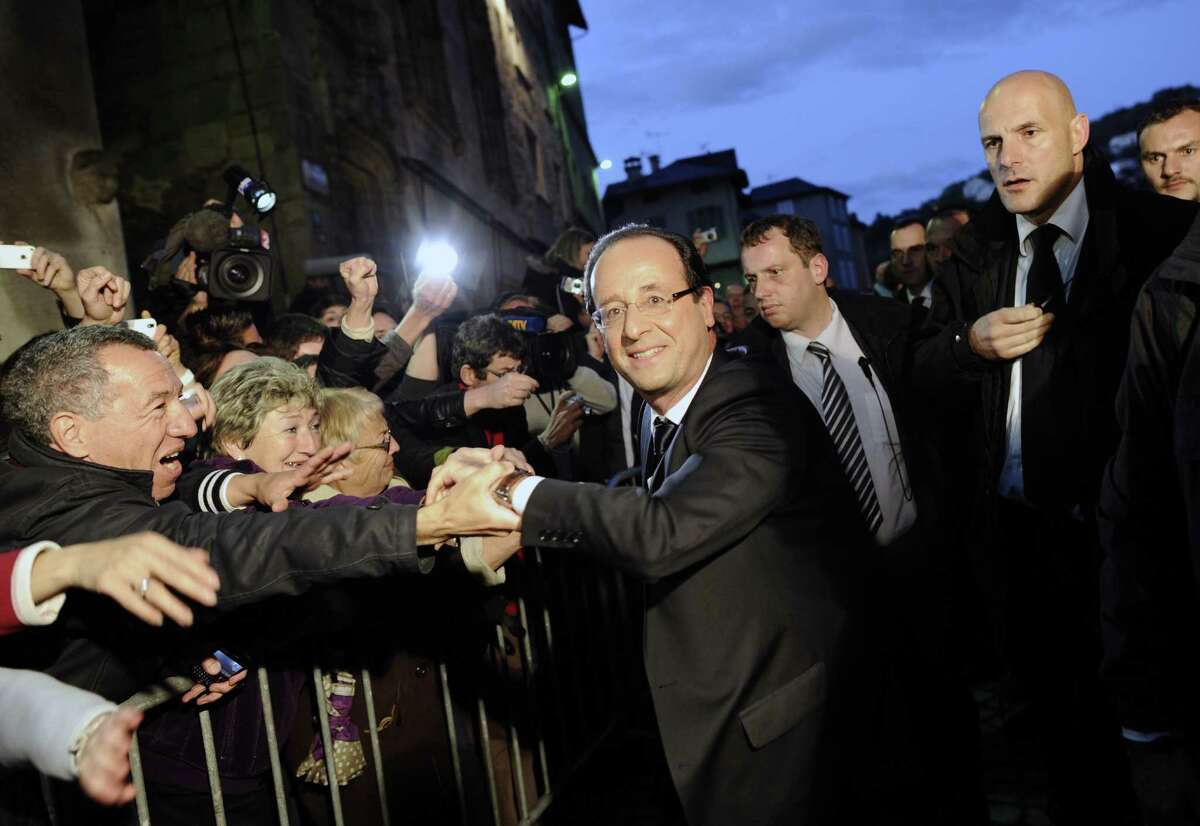 Socialist party newly elected president Francois Hollande arrives to give a speech after winning the second round of the presidential election on May 6, 2012 in Tulle, southwestern France.