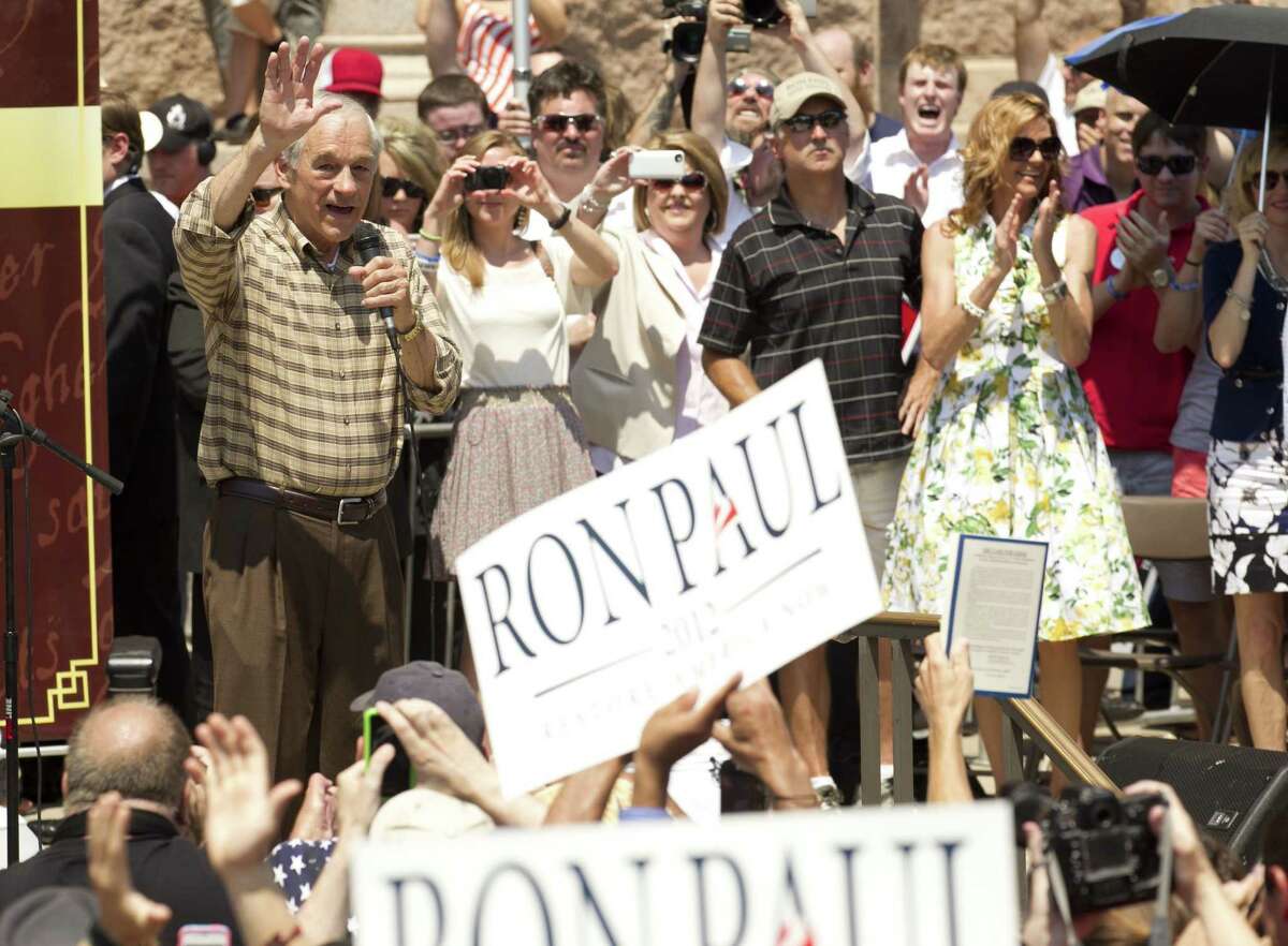 Ron Paul gets rock-star treatment at a tea party rally outside the Texas Capitol on Sunday. (Statesman.com)