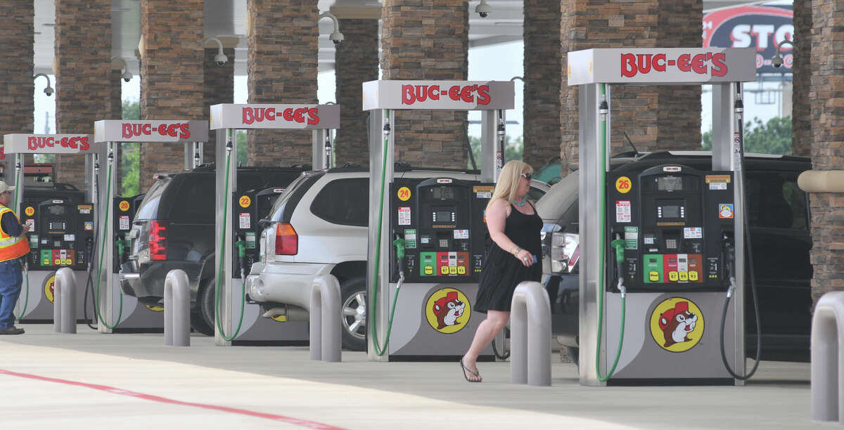 Motorists crowd the fuel pumps on opening day of the Buc-ee's store in New Braunfels Monday, May 7, 2012.