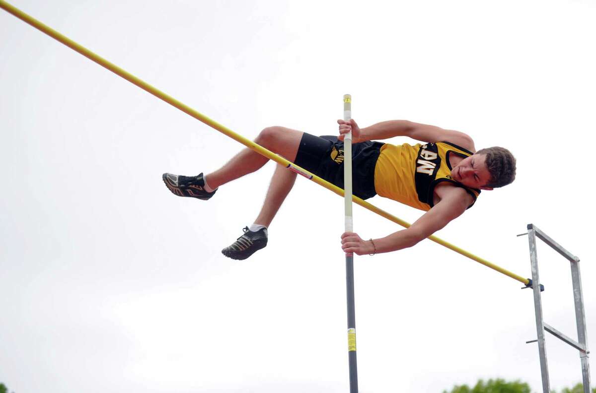 Jonathan Law's Mark Thibault clears 11.6 feet in the pole vault event Tuesday, May 8, 2012 during a track meet at Foran High School in Milford, Conn.