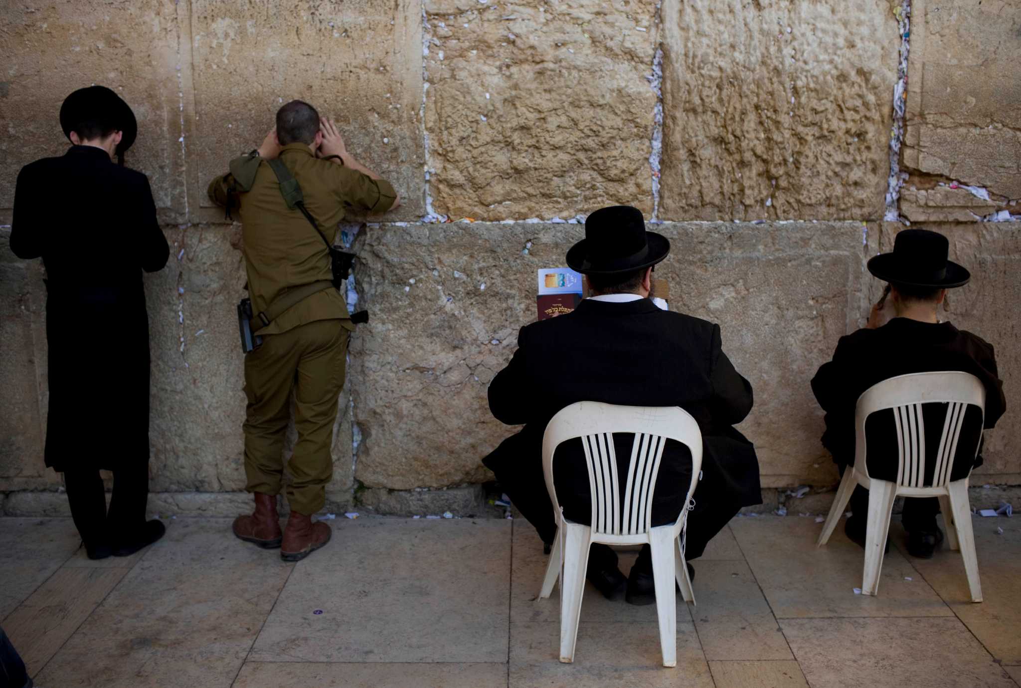 New Israeli coalition confronts first challenge