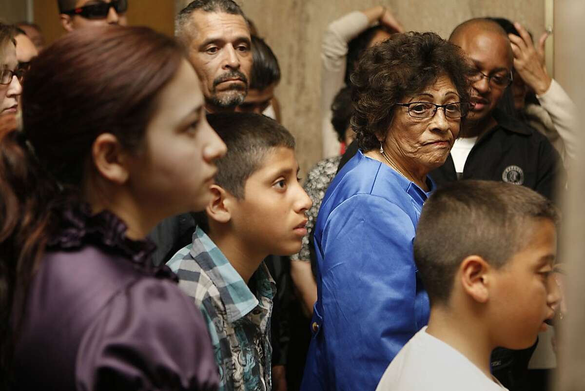 Danielle Bologna's mother (in blue) waits to enter the courtroom with friends and family at the Hall of Justice in San Francisco, Calif., to hear the jury's verdict on Wednesday, May 10, 2012. Edwin Ramos, 25, was convicted today of the mistaken-identity murders of a San Francisco father and his two sons.