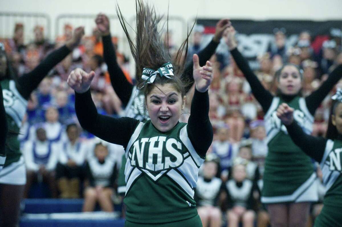In thsi file photo Norwalk High School competes in the FCIAC Cheerleading Championships in Wilton, Conn., Sunday February 6, 2011.