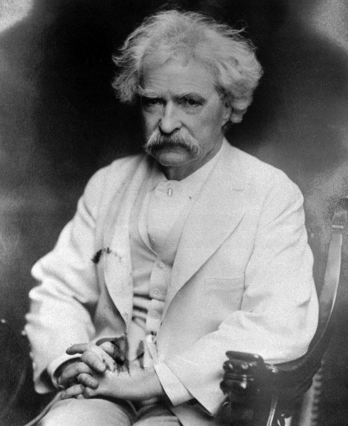 FILE - Author Samuel Longhorne Clemens, better known under his pen name, Mark Twain, is seen in this undated file photo. Twain grew up along the Mississippi River and became a riverboat pilot. He used that setting for some of the great fiction classics. 