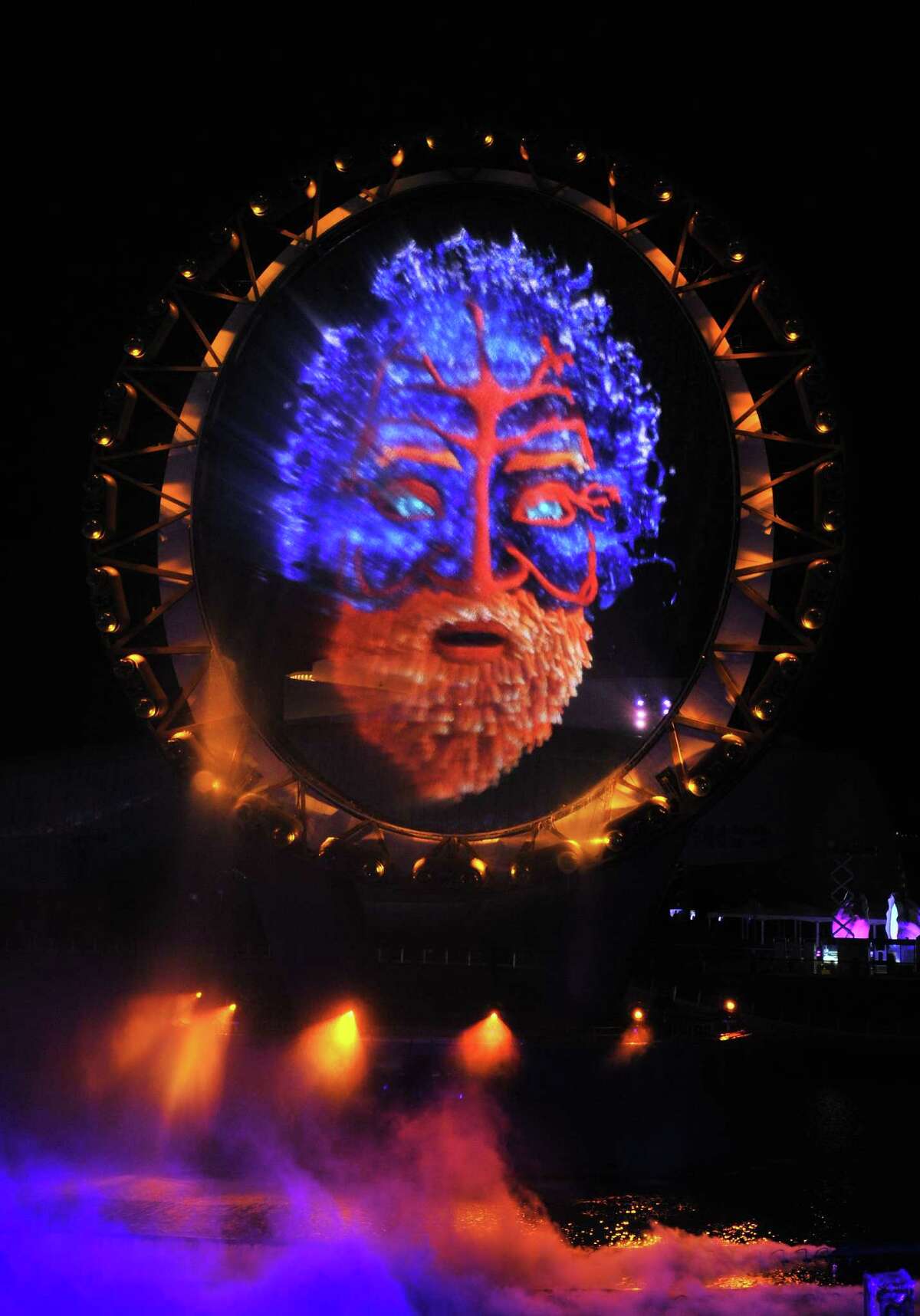The Big-O, a giant circular structure for nightly laser and light shows, is seen lit up during the opening ceremony of the Expo 2012 in Yeosu, a small city on South Korea's south coast, on May 11, 2012. After four years of work and 10 billion USD in investment, an international expo will start on May 12 at a glittering hi-tech venue on the site of a former dusty cement terminal in South Korea under the theme of "The Living Ocean and Coast". AFP PHOTO / JUNG YEON-JEJUNG YEON-JE/AFP/GettyImages