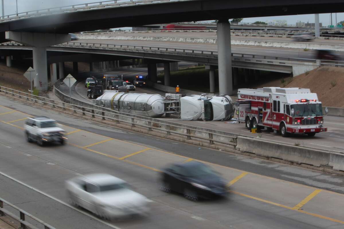 A big rig overturned in a traffic crash and spilled its load of flour on U.S. 59 near Texas 288 just south of downtown Friday morning, forcing officials to temporarily shutdown the freeway near the wreck site.