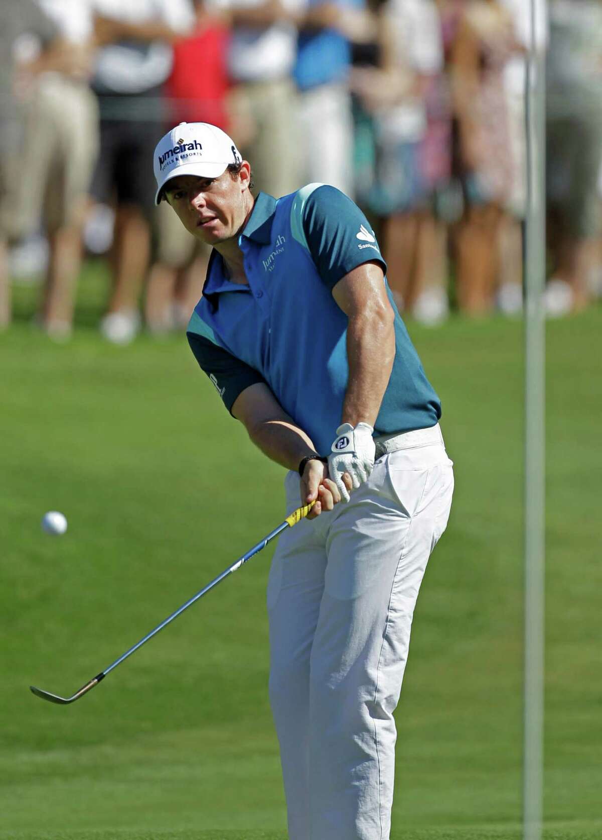 Rory McIlroy, of Northern Ireland, watches his chip to the 14th green during the second round of the Players Championship golf tournament at TPC Sawgrass, Friday, May 11, 2012, in Ponte Vedra Beach, Fla. (AP Photo/Chris O'Meara)