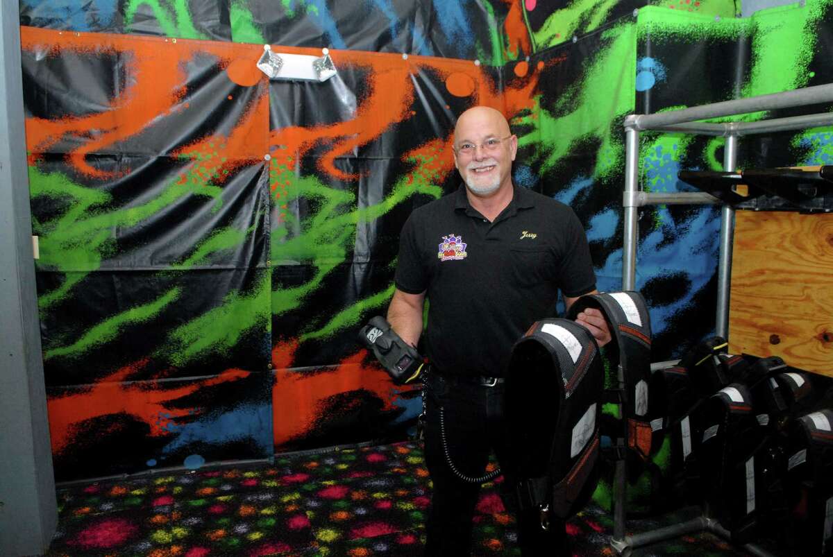 Jerry Petrini, owner of My Three Sons in Norwalk, Conn. on Friday May 11, 2012, with some of the new laser tag equiptment he was able to buy to expand his business through a grant from the Small Business Express Program.