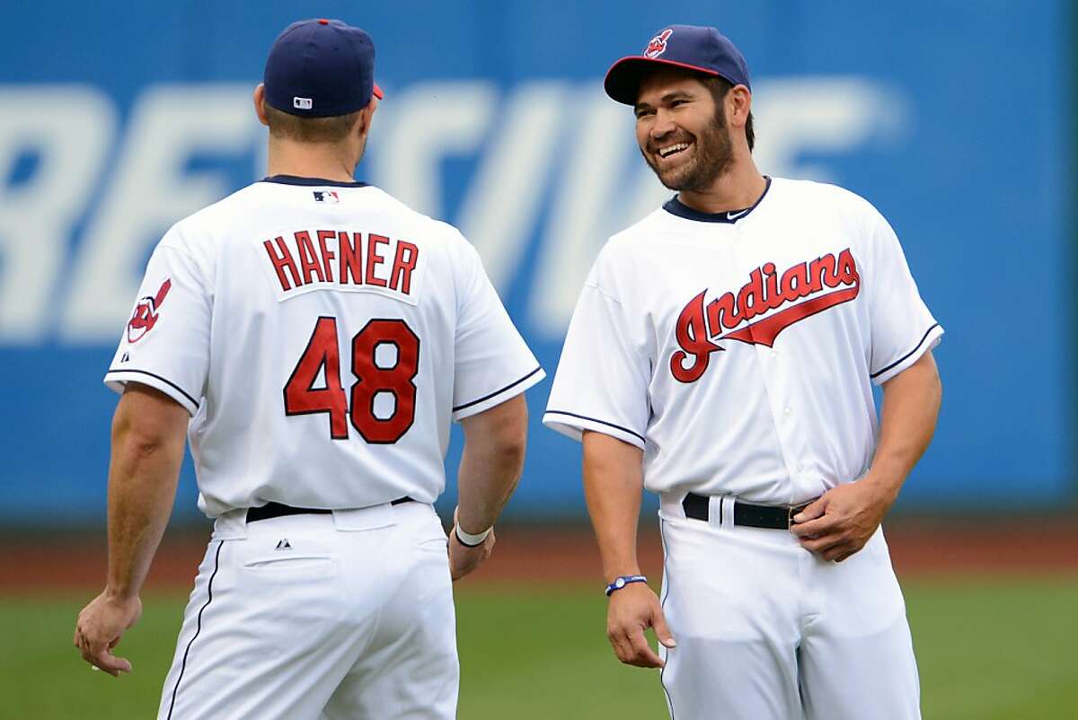 CLEVELAND, OH - MAY 4: Travis Hafner #48 talks with new teammate Johnny Damon #33 of the Cleveland Indians prior to the start of the game against the Texas Rangers at Progressive Field on May 4, 2012 in Cleveland, Ohio. (Photo by Jason Miller/Getty Images)