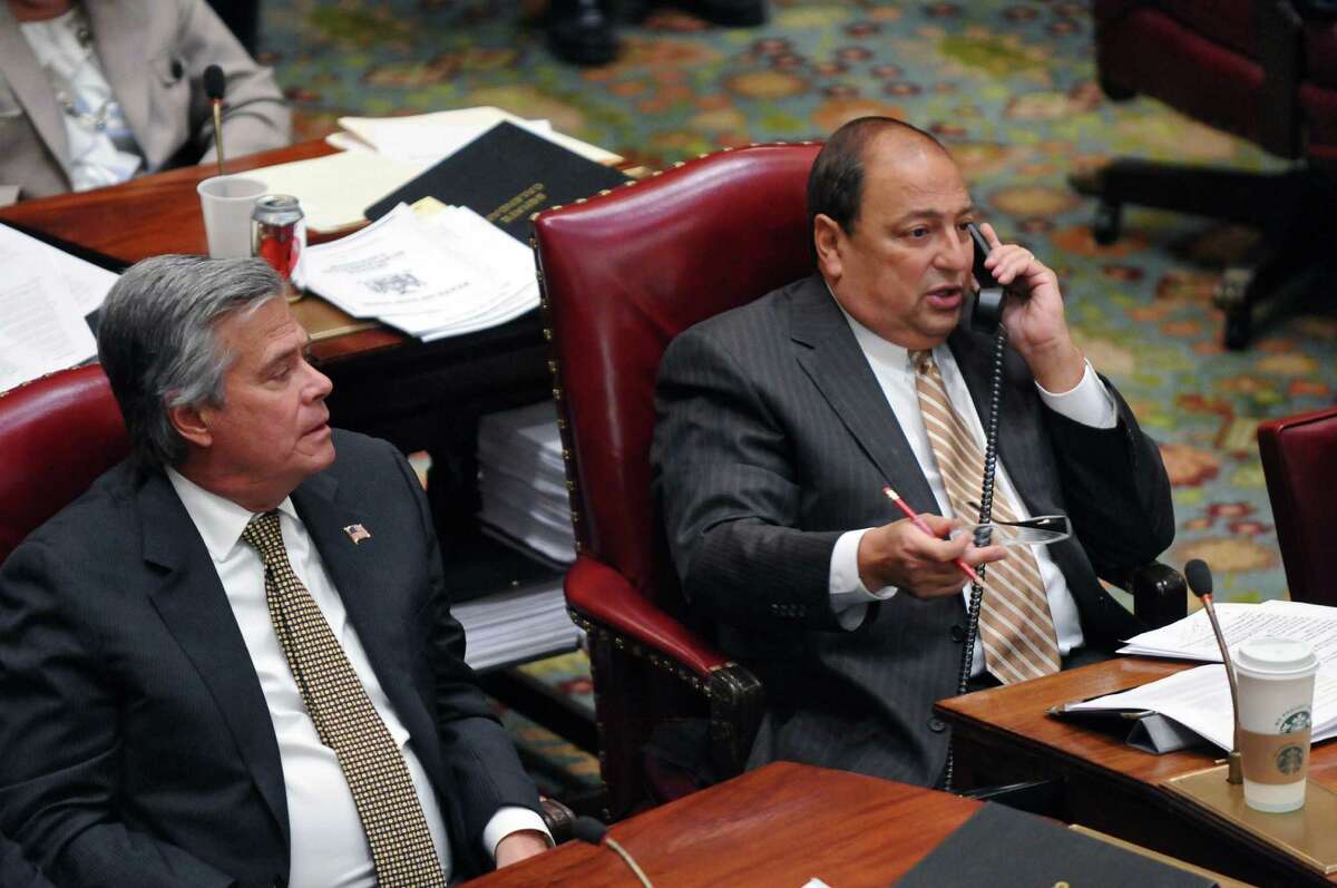 State Majority Leader Dean Skelos, left, and Deputy Majority Leader Tom Libous, right, on the floor of the Senate chamber during budget voting in the Capitol on Wednesday, March 28, 2012 in Albany, N.Y. (Philip Kamrass / Times Union)