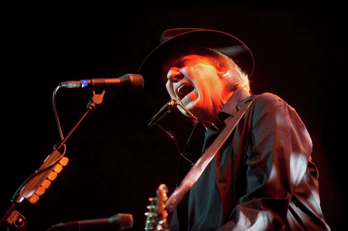In this photo provided by Robin Hood, musician Neil Young performs onstage at the Robin Hood Annual Benefit, Monday, May 14, 2012, at the Javits Center in New York. Robin Hood funds programs that fight poverty in New York City.