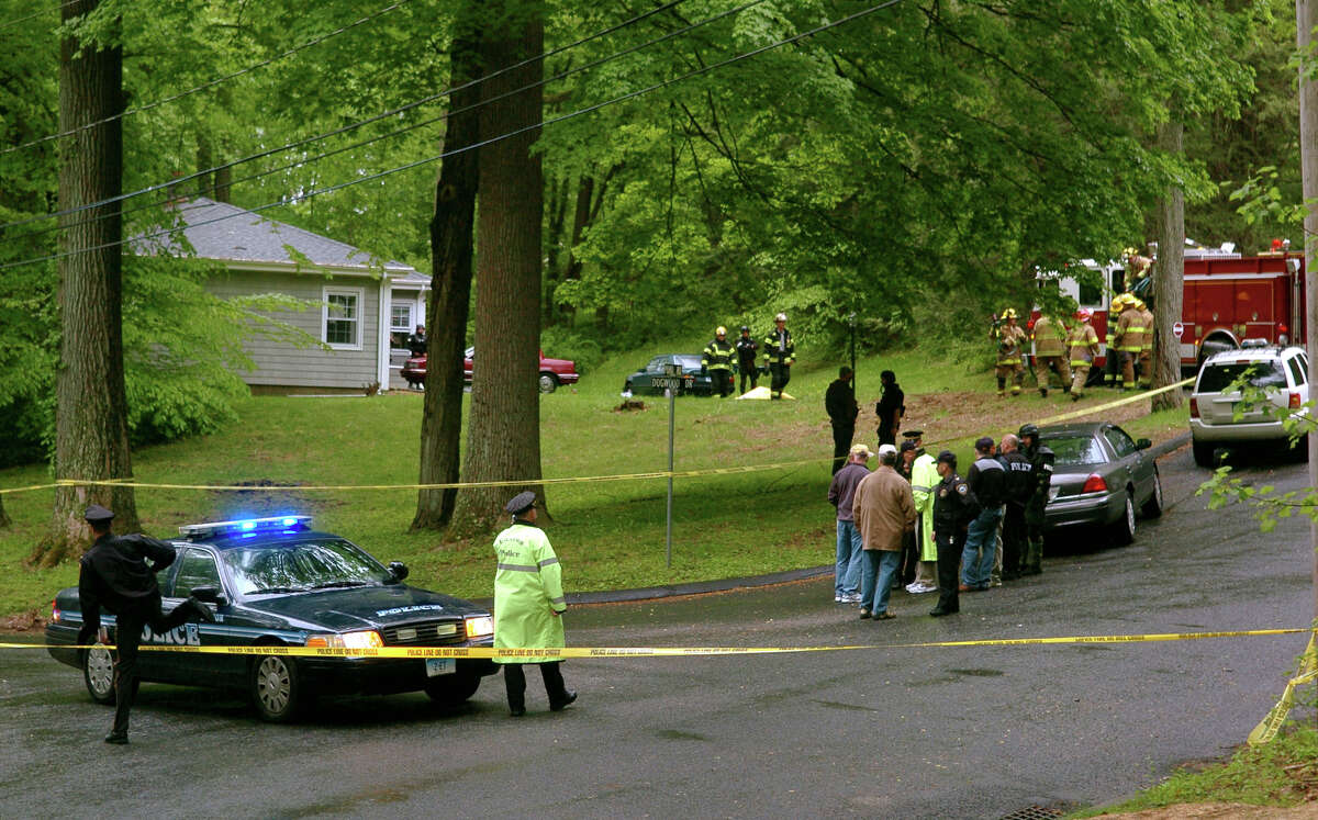 Police at the home on Dogwood Drive, in Easton, Conn. where Gonzalo Guizan was shot and killed by police during a raid on May 18th, 2008.
