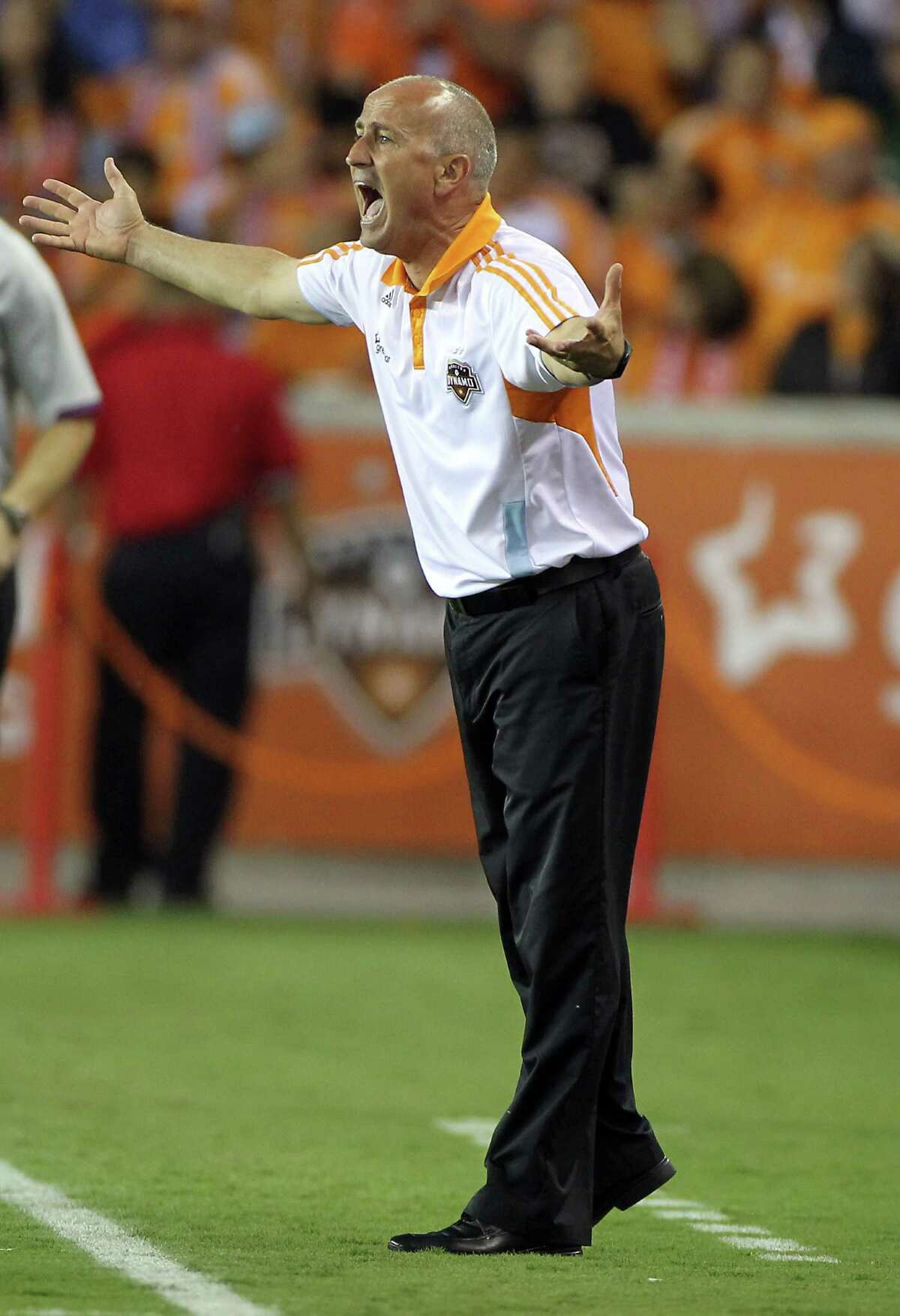 Dynamo coach Dominic Kinnear pleads for a call.