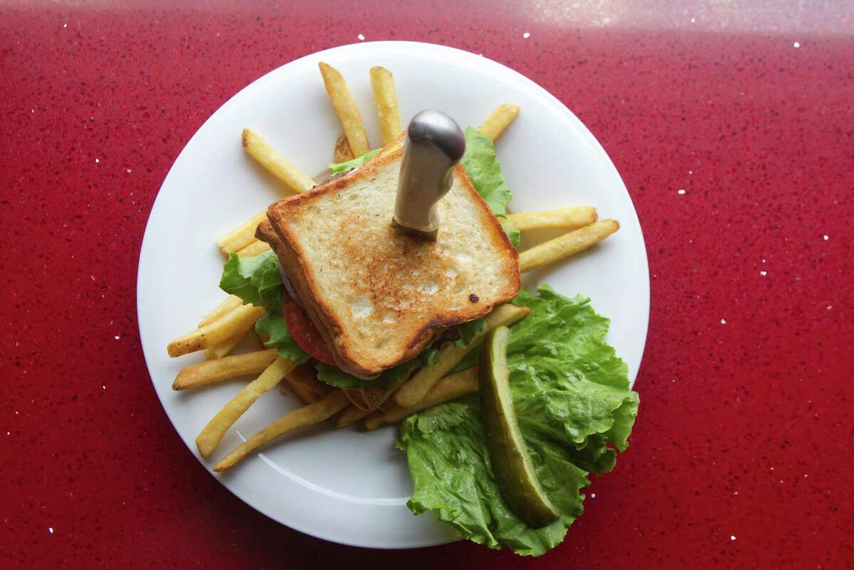 5/7/2012 : The Ginormous BLT Double Grilled Cheese Ranch Burger at Houston Texans Grille located at 12848b Queensbury Lane, Suite 208, Houston, Texas in the City Centre at I-10 and Beltway * in Houston, Texas, For the Chronicle: Thomas B. Shea