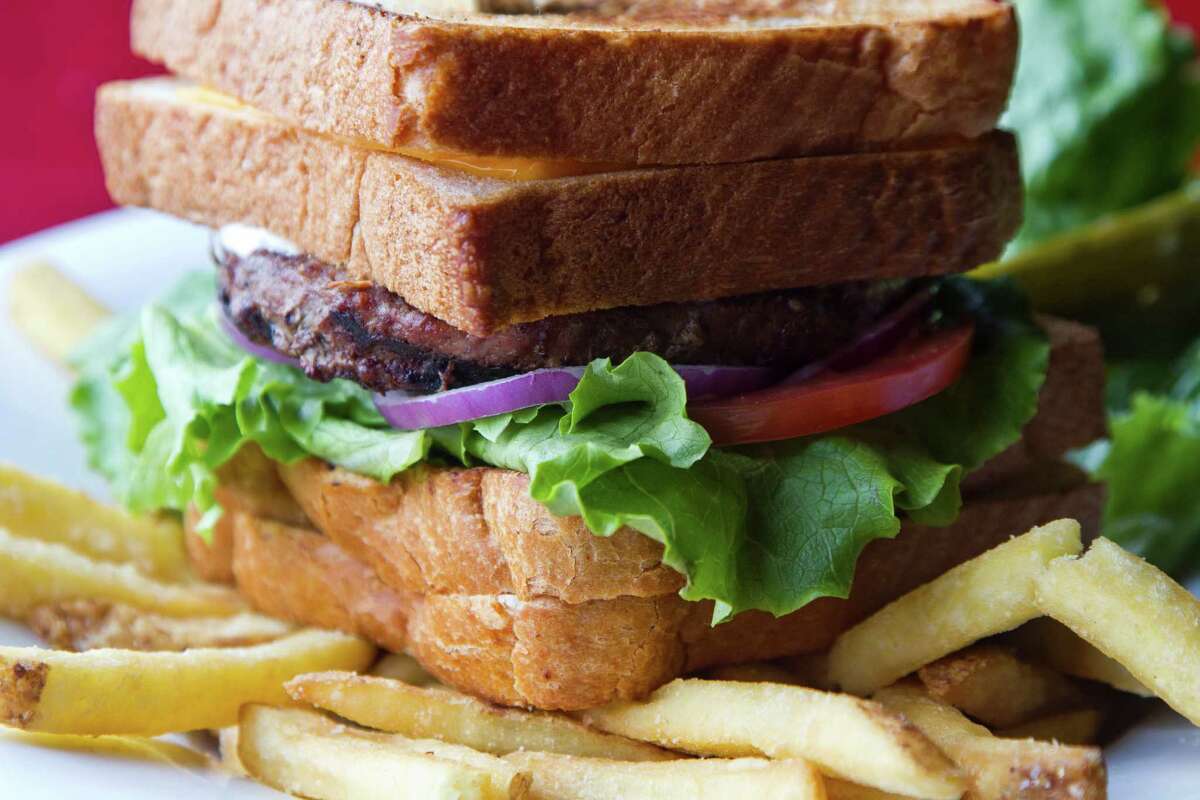 5/7/2012 : The Ginormous BLT Double Grilled Cheese Ranch Burger at Houston Texans Grille located at 12848b Queensbury Lane, Suite 208, Houston, Texas in the City Centre at I-10 and Beltway * in Houston, Texas, For the Chronicle: Thomas B. Shea