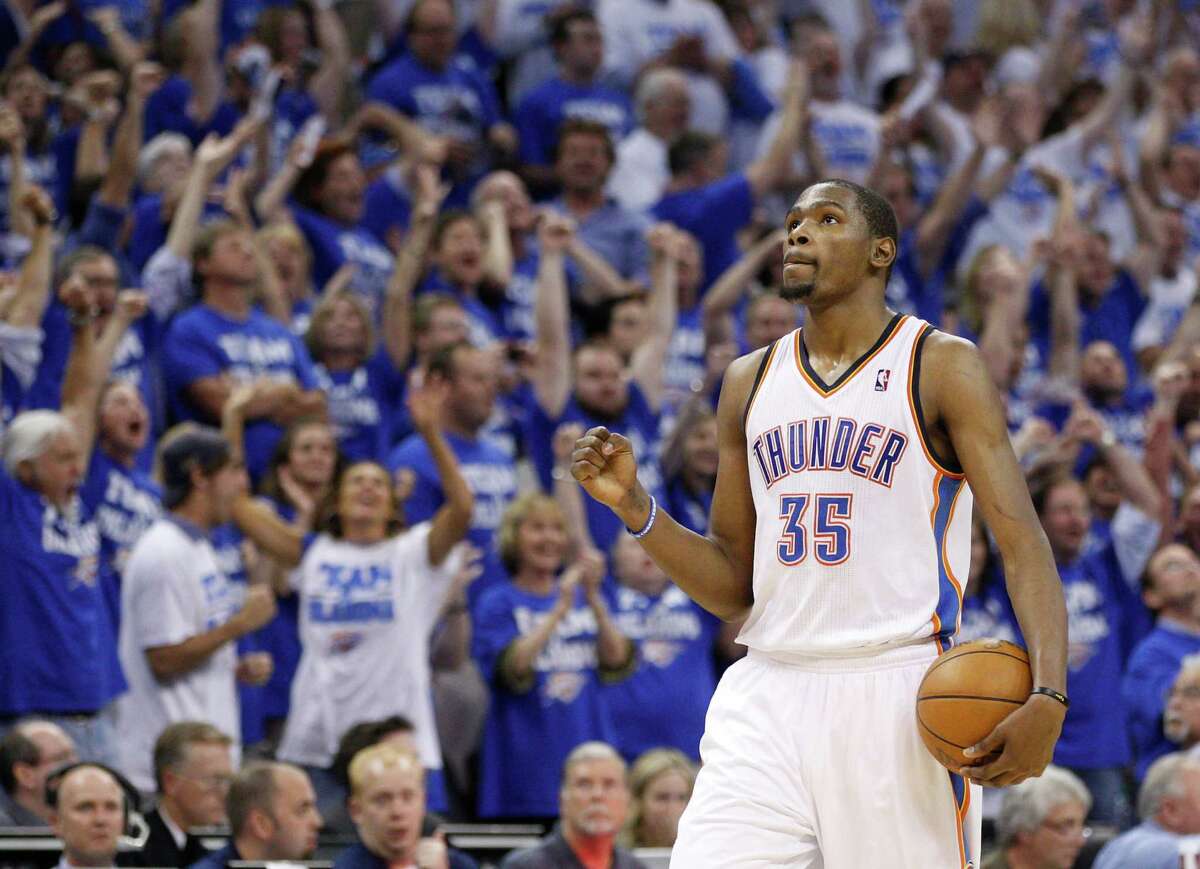 Oklahoma City Thunder forward Kevin Durant pumps his fist late in the fourth quarter in Game 2 of an NBA basketball playoffs Western Conference semifinal, in Oklahoma City on Wednesday, May 16, 2012. Oklahoma City won 77-75. (AP Photo/Sue Ogrocki)