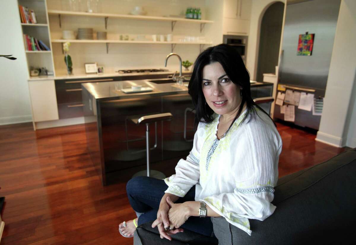 Mary Burchett in her renovated kitchen on April 25, 2012.