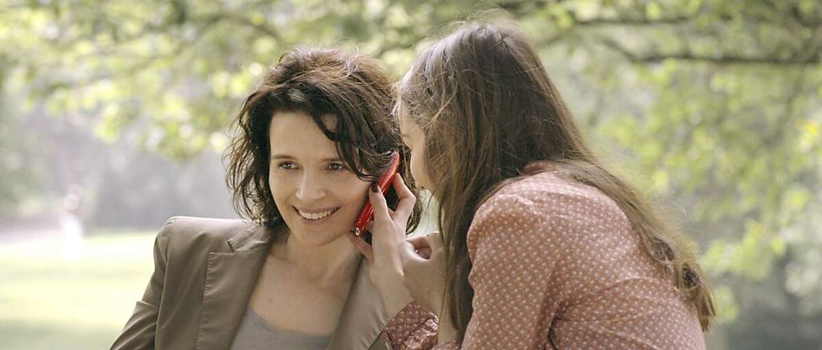 Juliette Binoche and Ana•s Demoustier in Elles, a film by Malgorzata Szumowska.