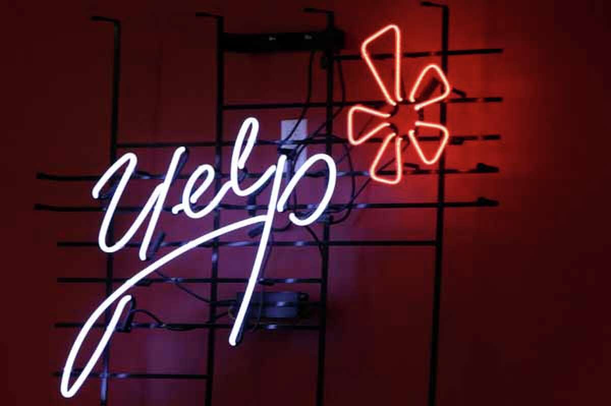 Online reviews site Yelp was expected to price its initial public offering of stock on Thursday, March 1, 2012, at $15 a share.First-day’s close: $24.58, up 64 percent from IPO price. (AP Photo/Kathy Willens)