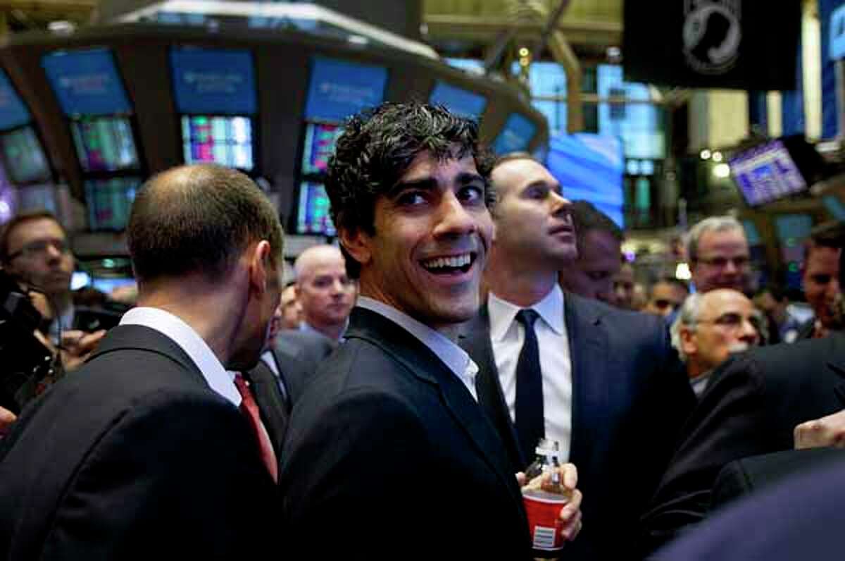 Jeremy Stoppelman, CEO of Yelp Inc., smiles on the floor of the New York Stock Exchange on Friday, March 2, 2012. (Jin Lee/Bloomberg)