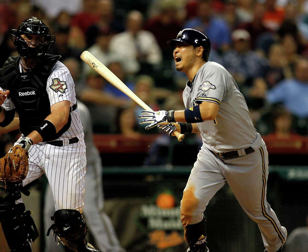 Milwaukee Brewers center fielder Norichika Aoki (7) screams as he is hit by a pitch.